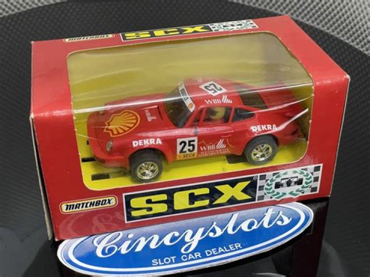 Who makes scx slot cars?